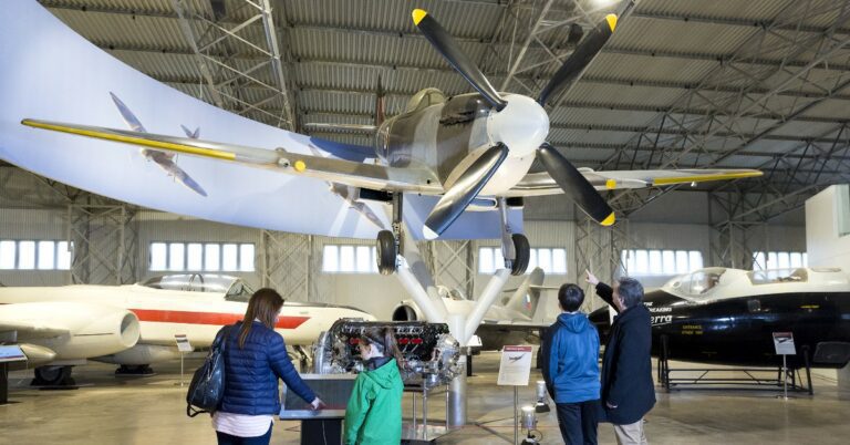 Visitors looking at the Supermarine Spitfire at the National Museum of Flight © Ruth Armstrong Photography
